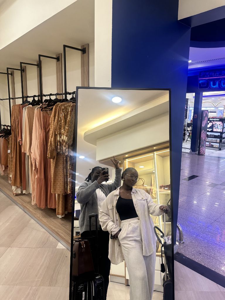 Marion & Tosin Shopping Mirror